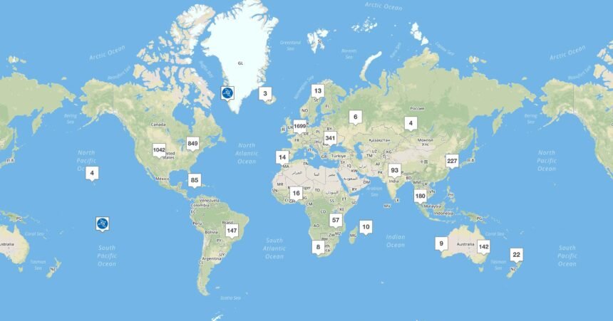 World map with data center server racks symbolizing national sovereign AI compute programs